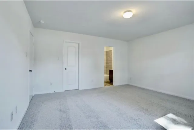 an empty room with an entryway