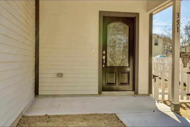 a view of a brick house with a door
