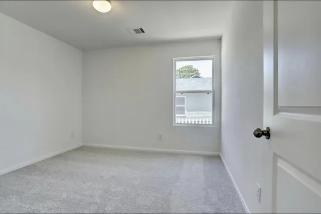 an empty room with an entryway