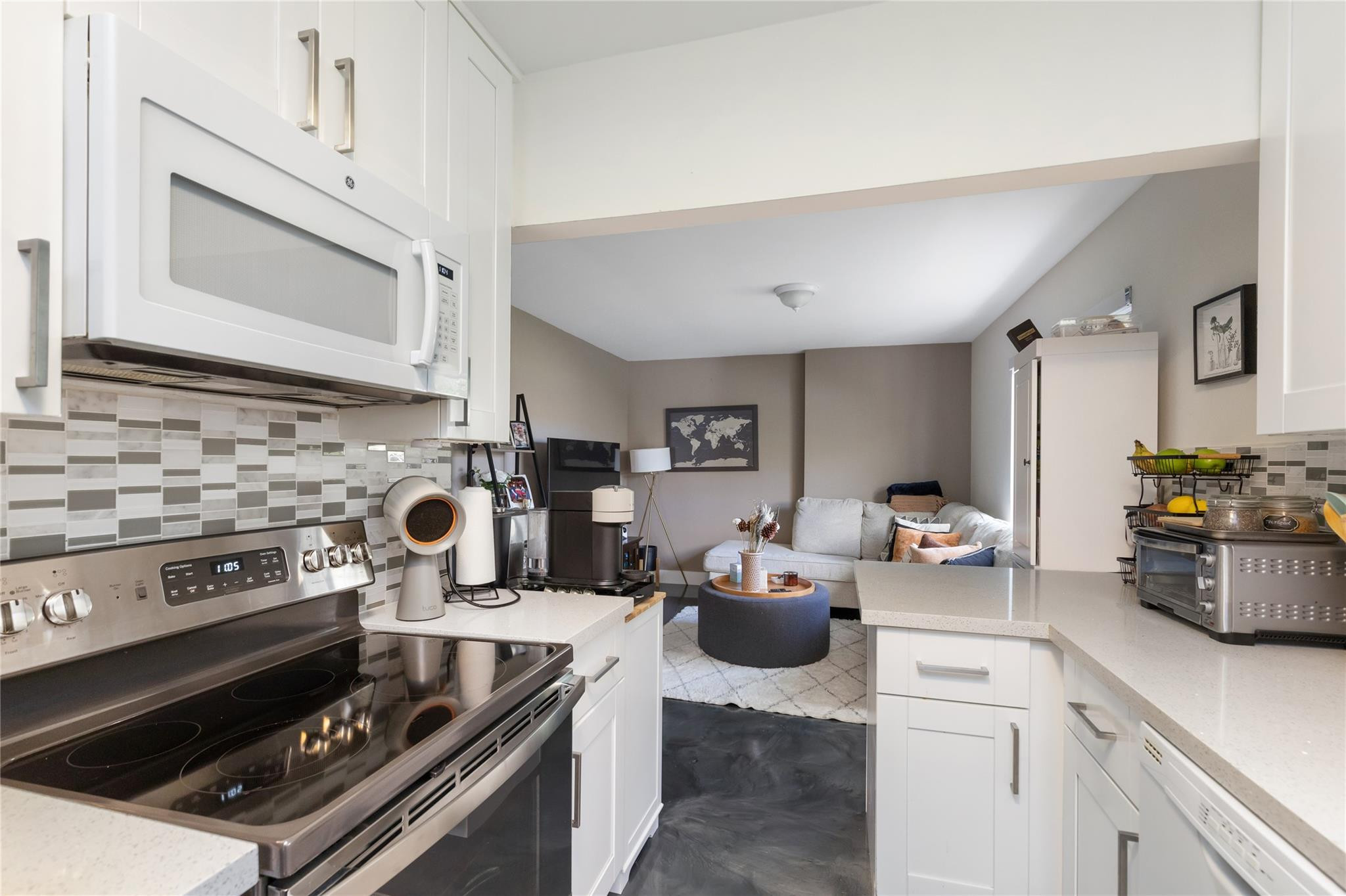 3461 Southwest 24th Street Miami, FL 33145 - Photo 11 of 55 a kitchen with a stove and a white cabinets