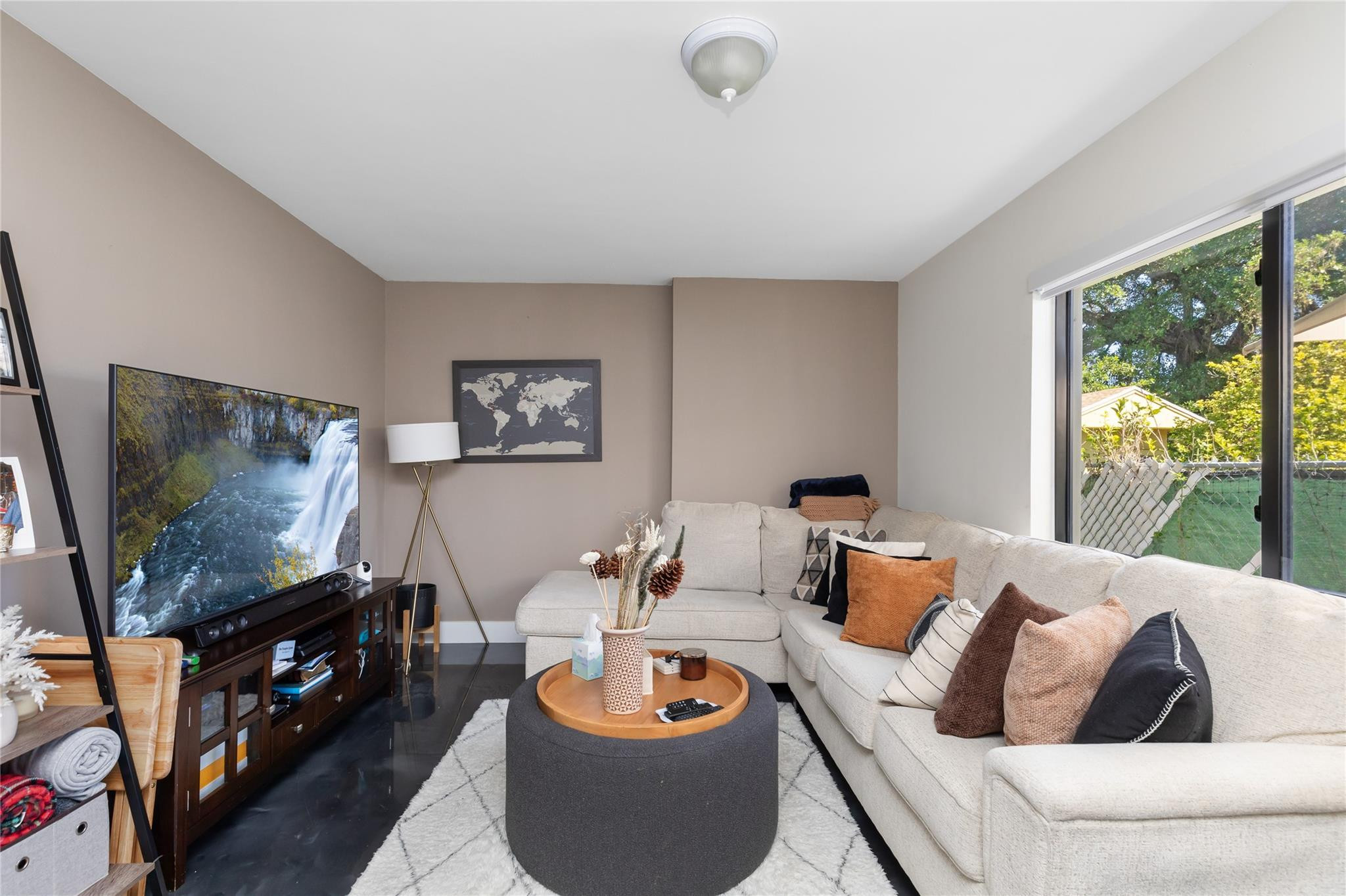 3461 Southwest 24th Street Miami, FL 33145 - Photo 16 of 55 a living room with furniture and a flat screen tv