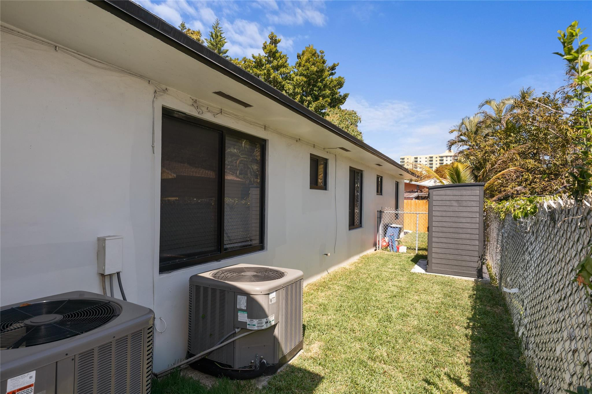 3461 Southwest 24th Street Miami, FL 33145 - Photo 29 of 55 a backyard of a house with table and chairs