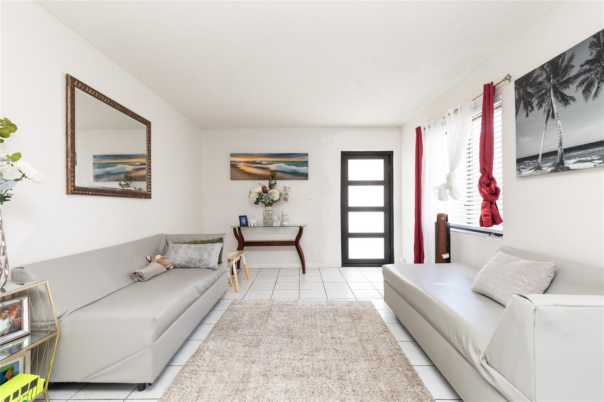 3461 Southwest 24th Street Miami, FL 33145 - Photo 32 of 55 a living room with furniture and a window