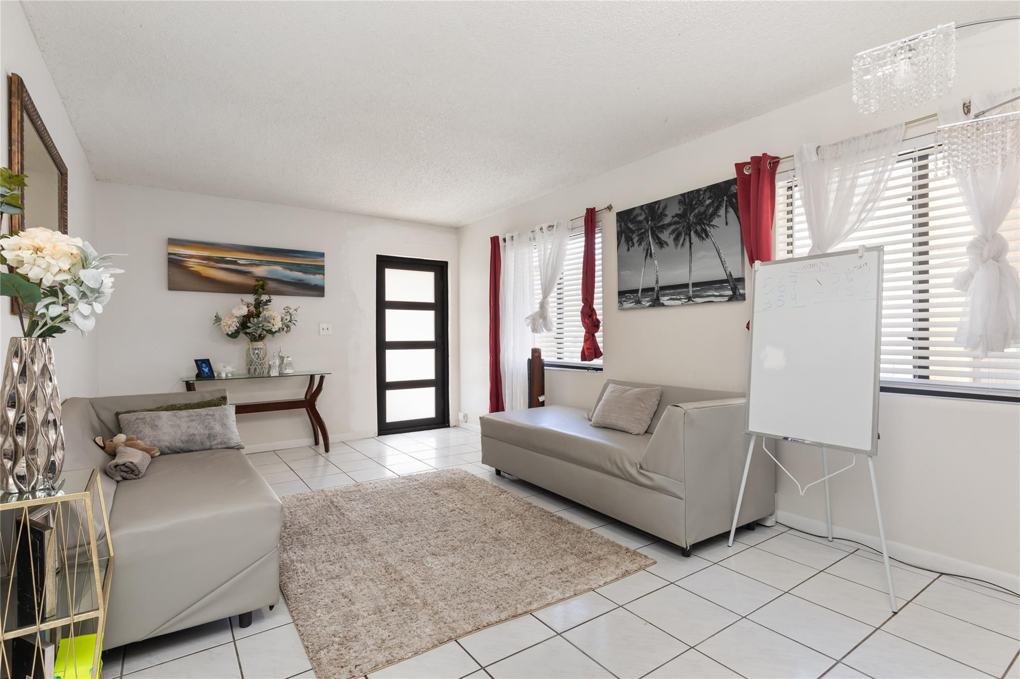 3461 Southwest 24th Street Miami, FL 33145 - Photo 33 of 55 a living room with furniture and a flat screen tv