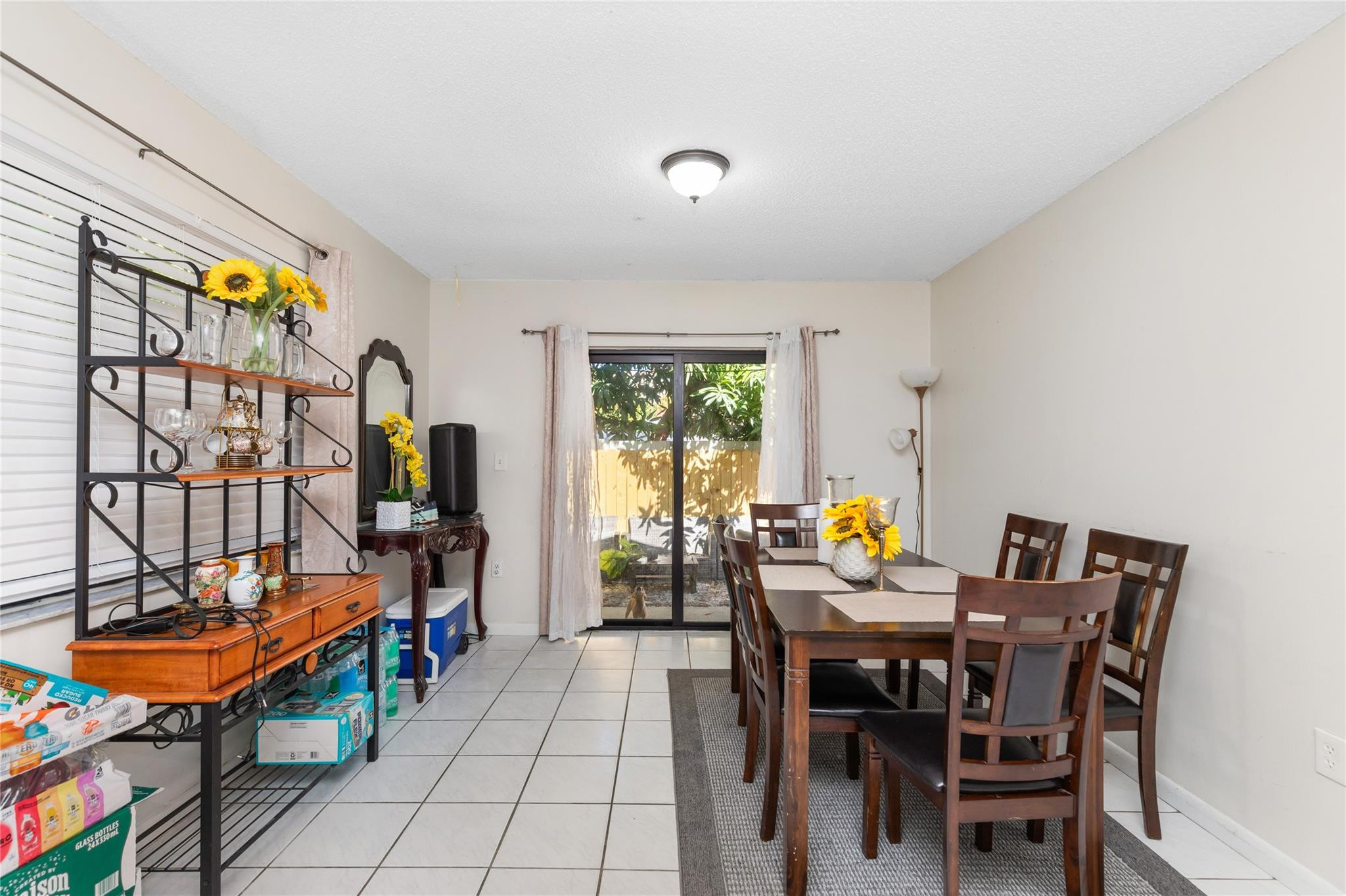 3461 Southwest 24th Street Miami, FL 33145 - Photo 40 of 55 a view of a dining room with furniture and a window