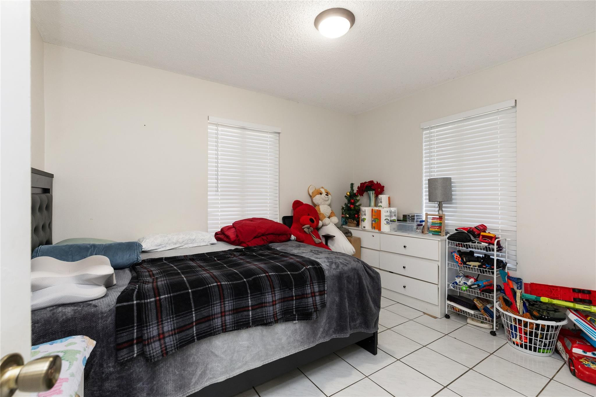 3461 Southwest 24th Street Miami, FL 33145 - Photo 42 of 55 a bedroom with a bed and a closet