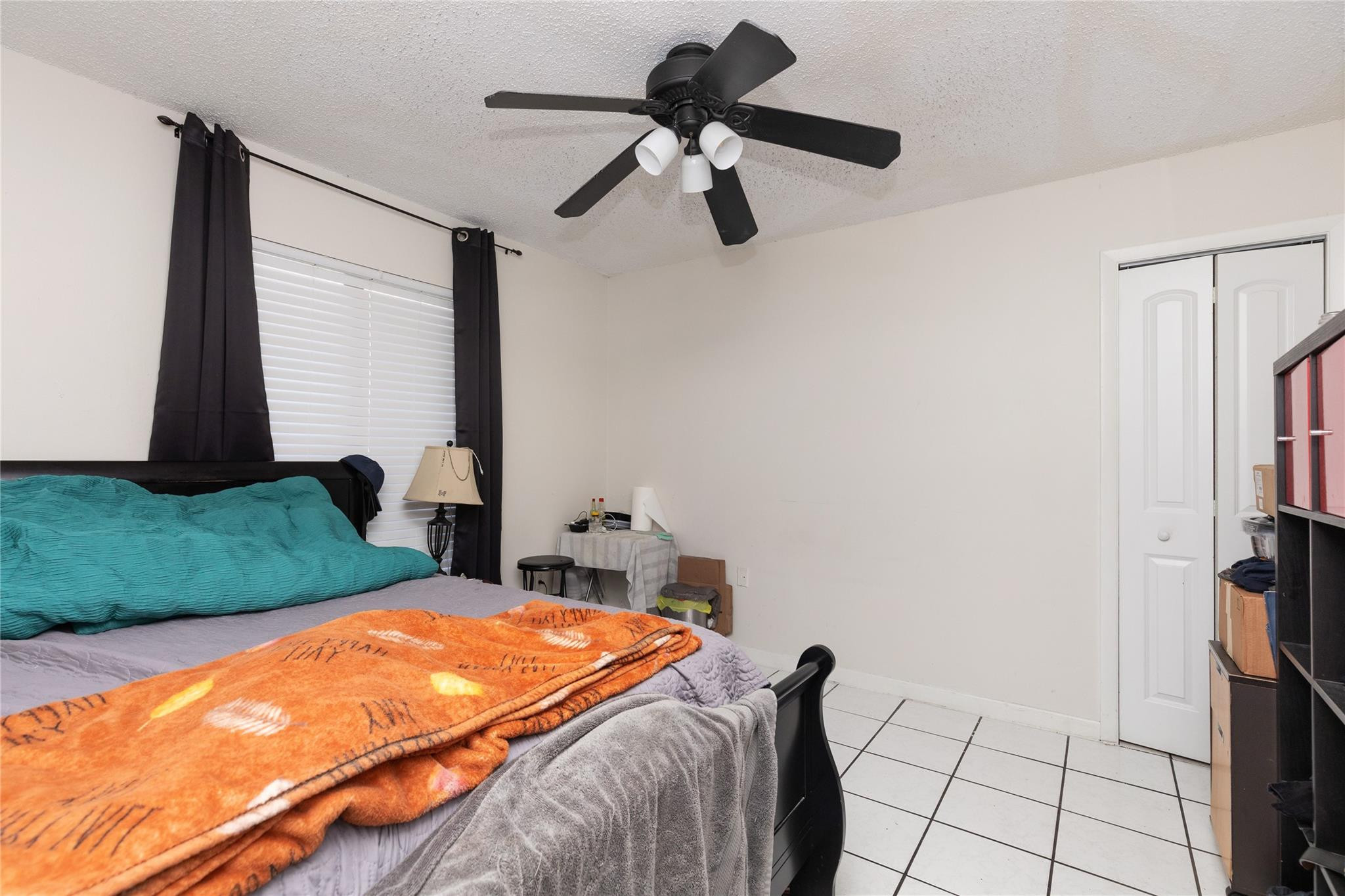 3461 Southwest 24th Street Miami, FL 33145 - Photo 46 of 55 a bed sitting in a room next to a window