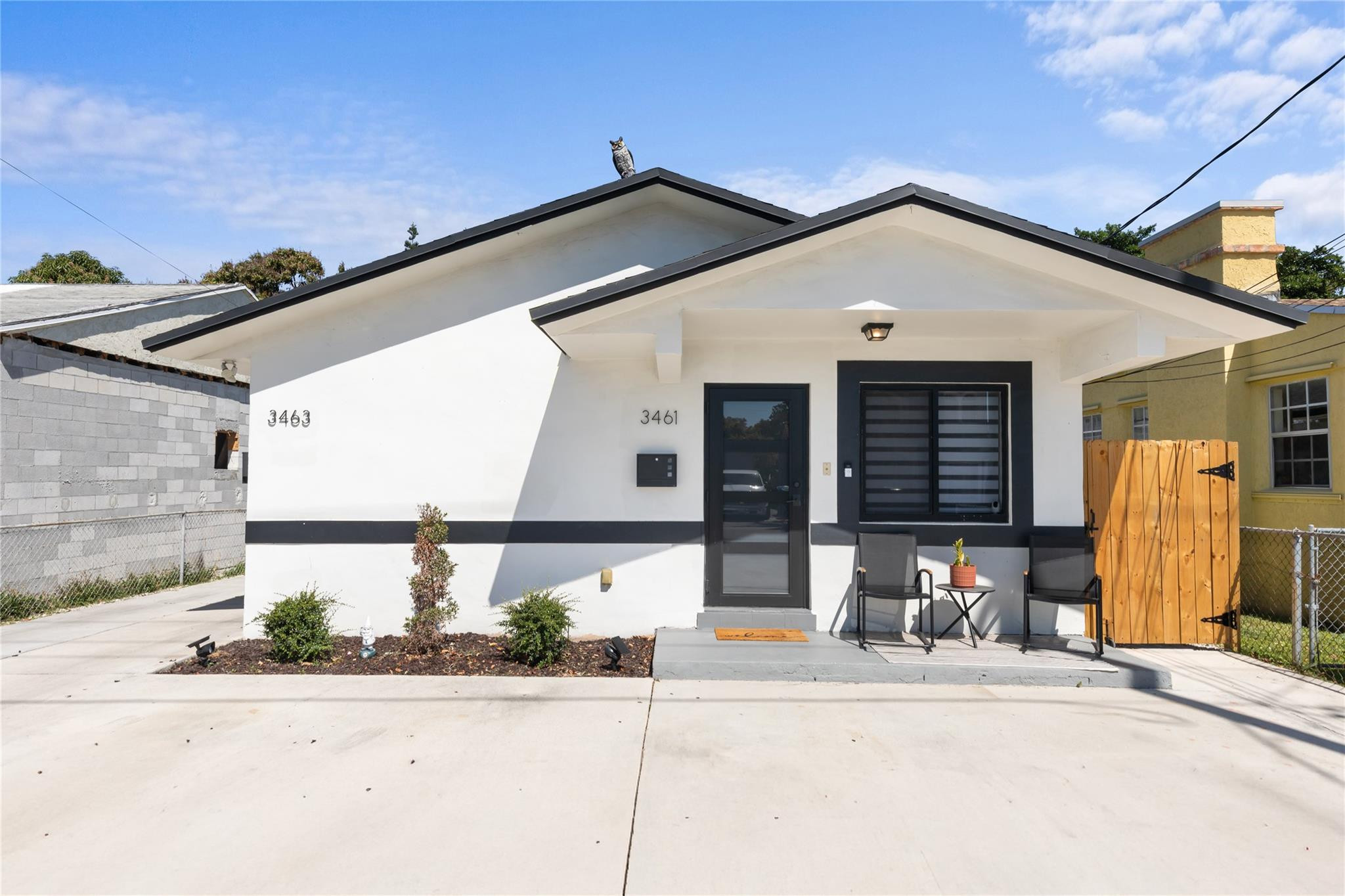 3461 Southwest 24th Street Miami, FL 33145 - Photo 55 of 55 a front view of a house with a yard and garage