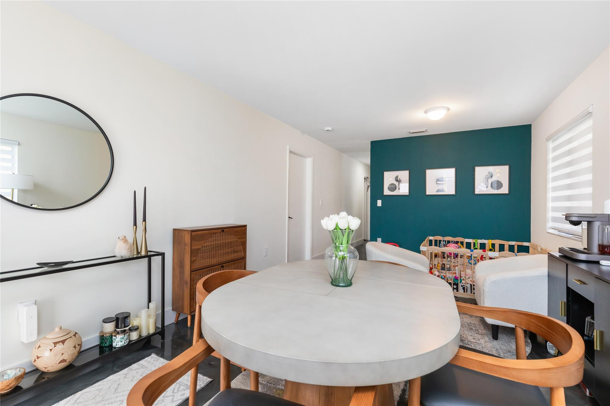 3461 Southwest 24th Street Miami, FL 33145 - Photo 7 of 55 a view of a dining room with furniture and a mirror