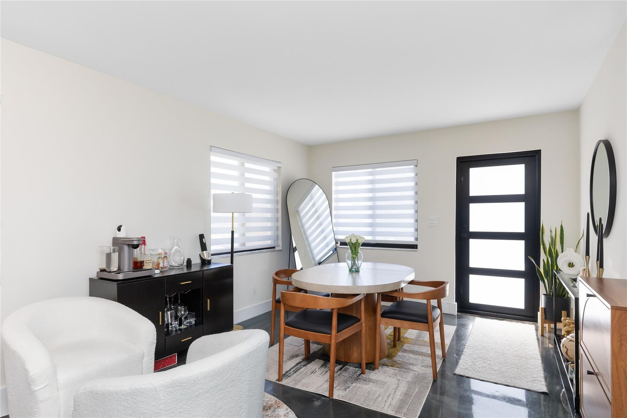 3461 Southwest 24th Street Miami, FL 33145 - Photo 8 of 55 a view of a dining room with furniture and a window