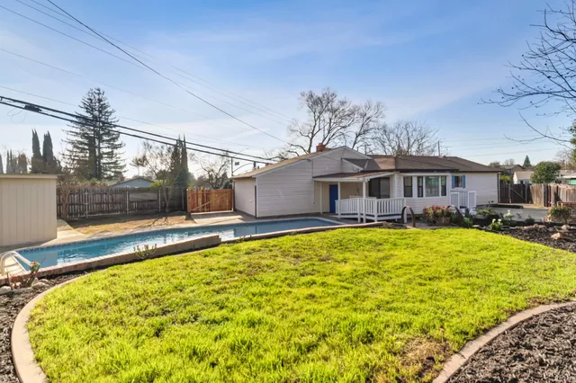a view of a house with a swimming pool