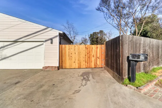 a view of a backyard of the house