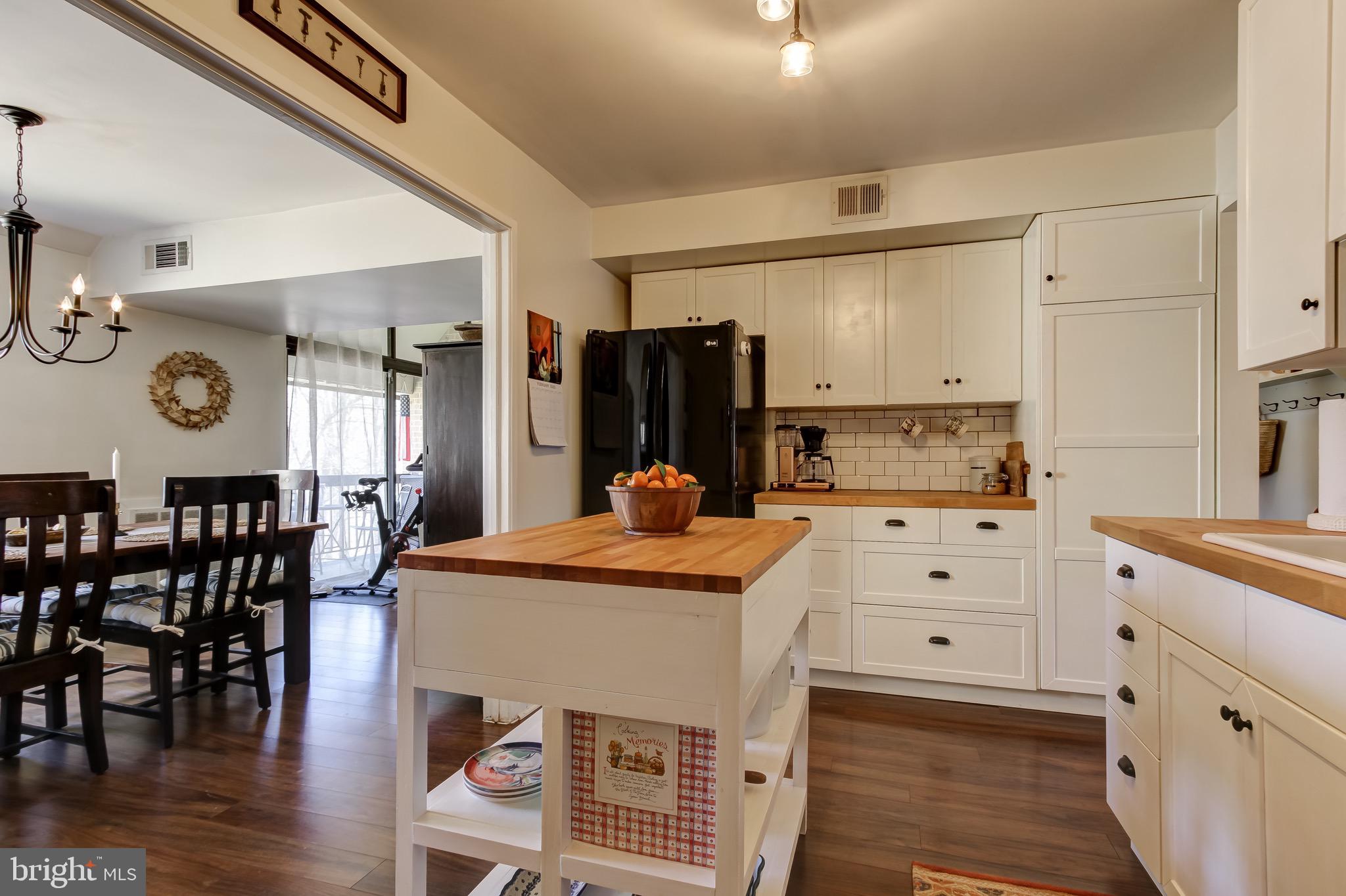 1663 Parkcrest Circle, Unit 300 Reston, VA 20190 - Photo 14 of 30 Kitchen Open to Dining Room