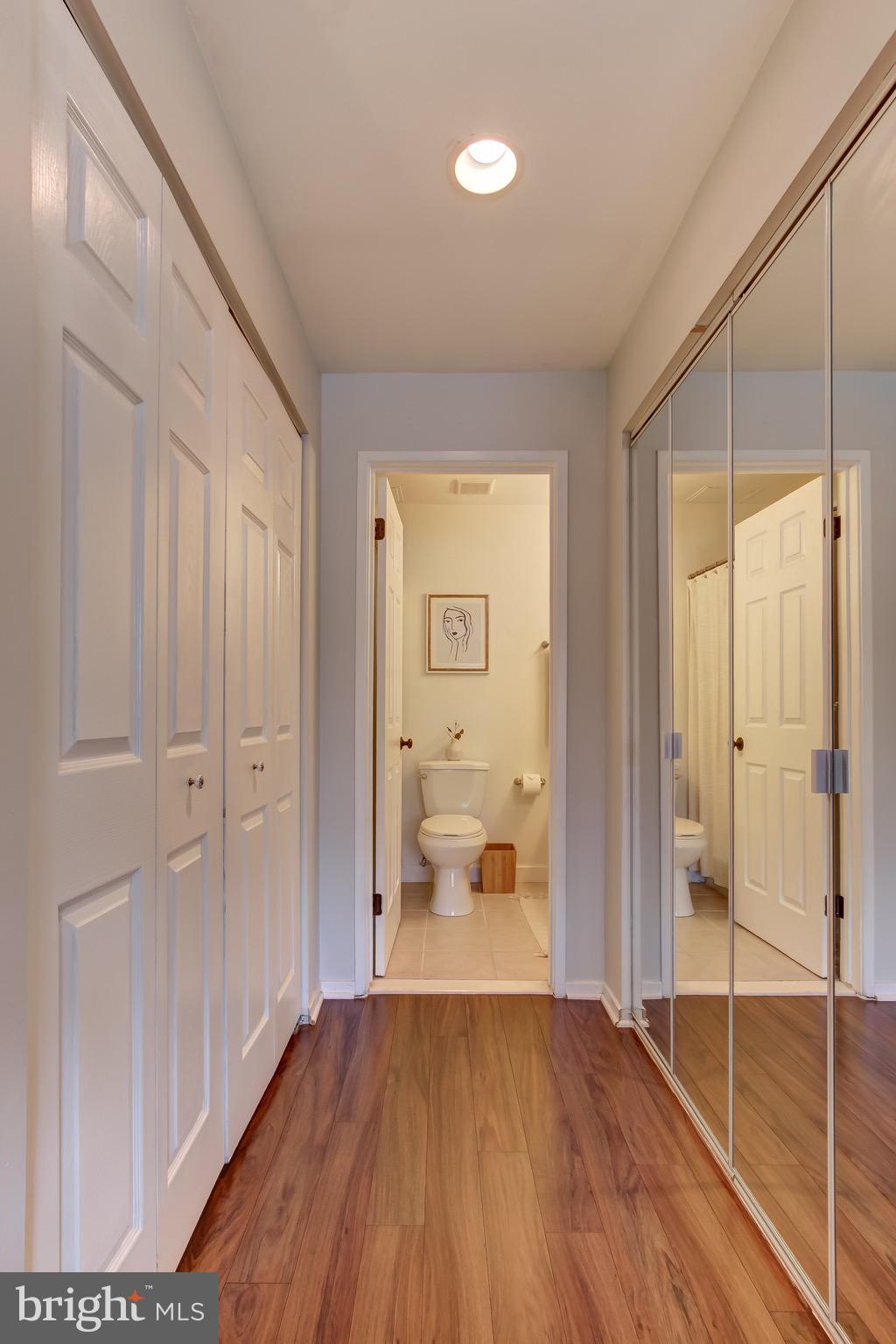 1663 Parkcrest Circle, Unit 300 Reston, VA 20190 - Photo 3 of 30 Hallway with Wood Floors