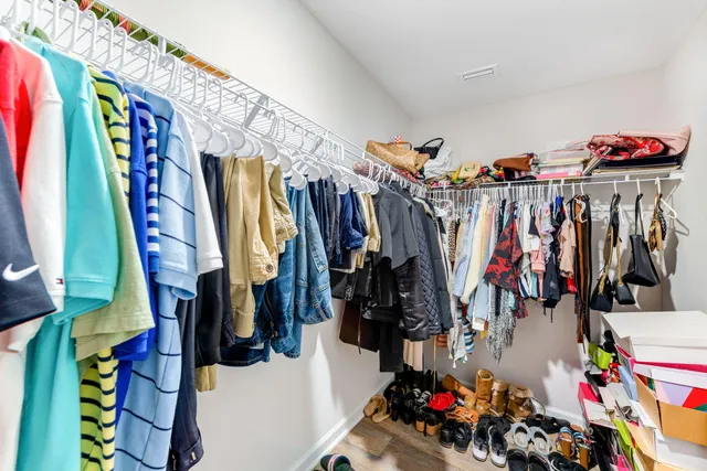 a bedroom with a bed and a view of bathroom