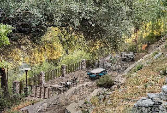 a backyard of a house with lots of green space