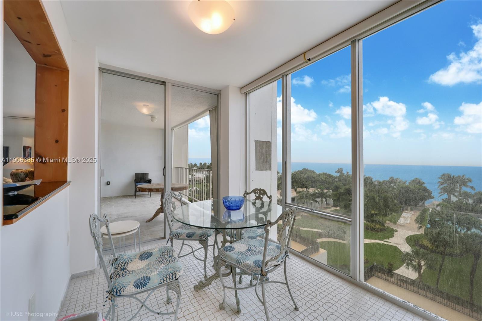 881 Ocean Drive, Unit 5D Key Biscayne, FL 33149 - Photo 8 of 18 a outdoor space with furniture