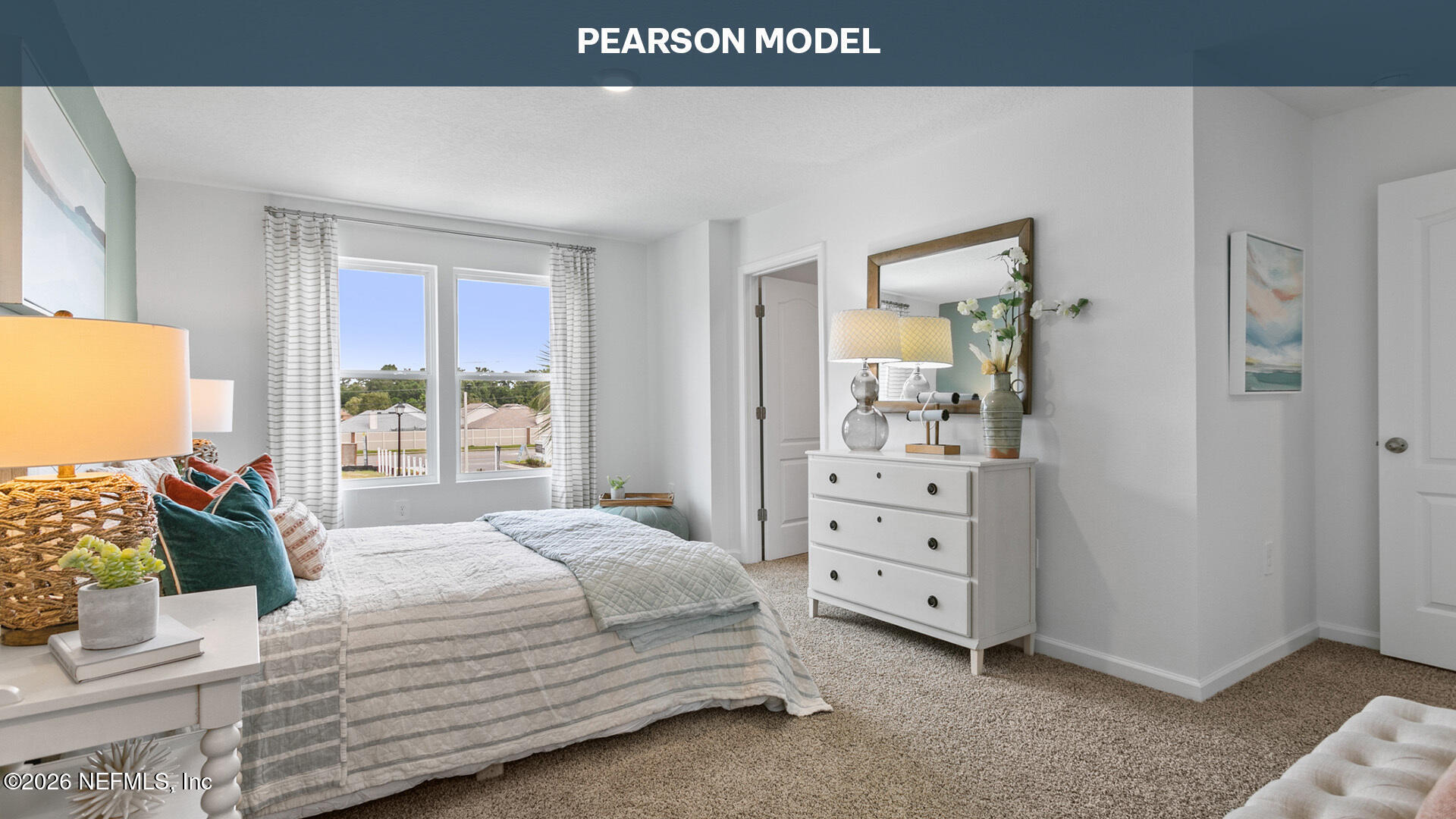 14457 Canter Road Jacksonville, FL 32234 - Photo 21 of 34 a bedroom with a bed and a window