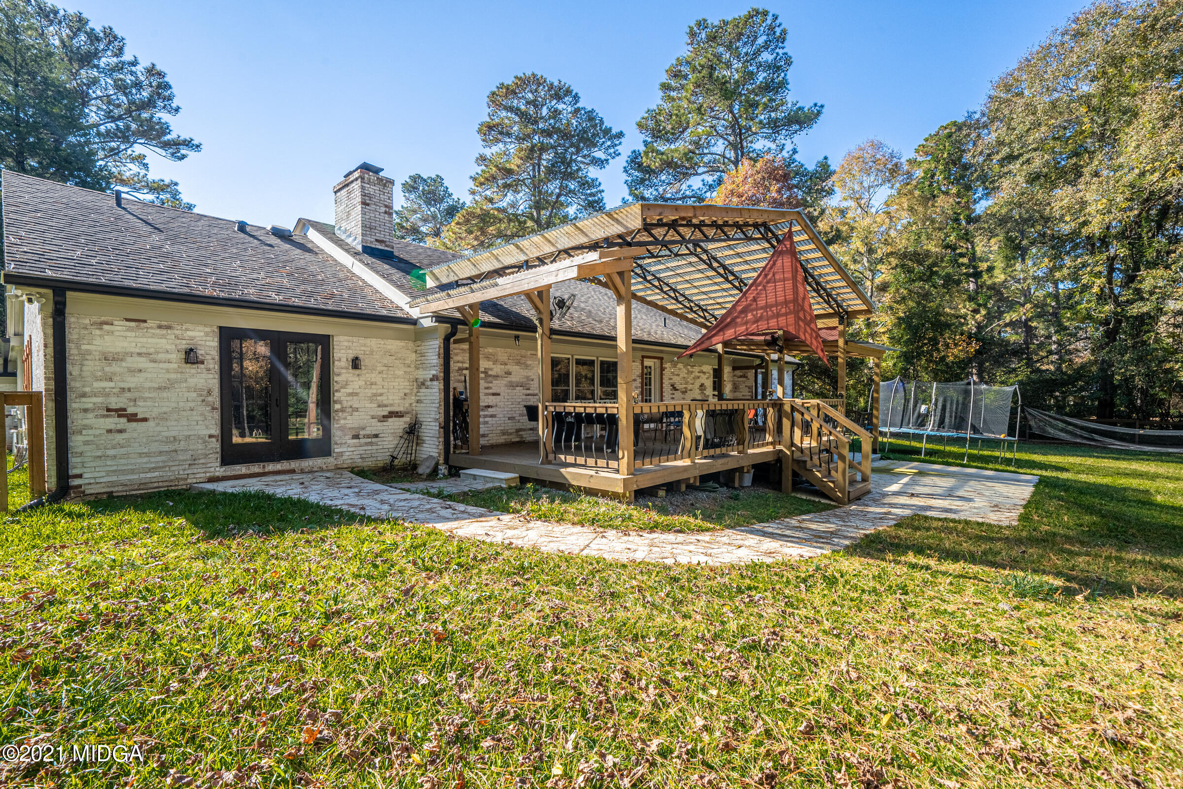 6251 Forsyth Road Macon, GA 31210 - Photo 14 of 82 a view of a house with backyard