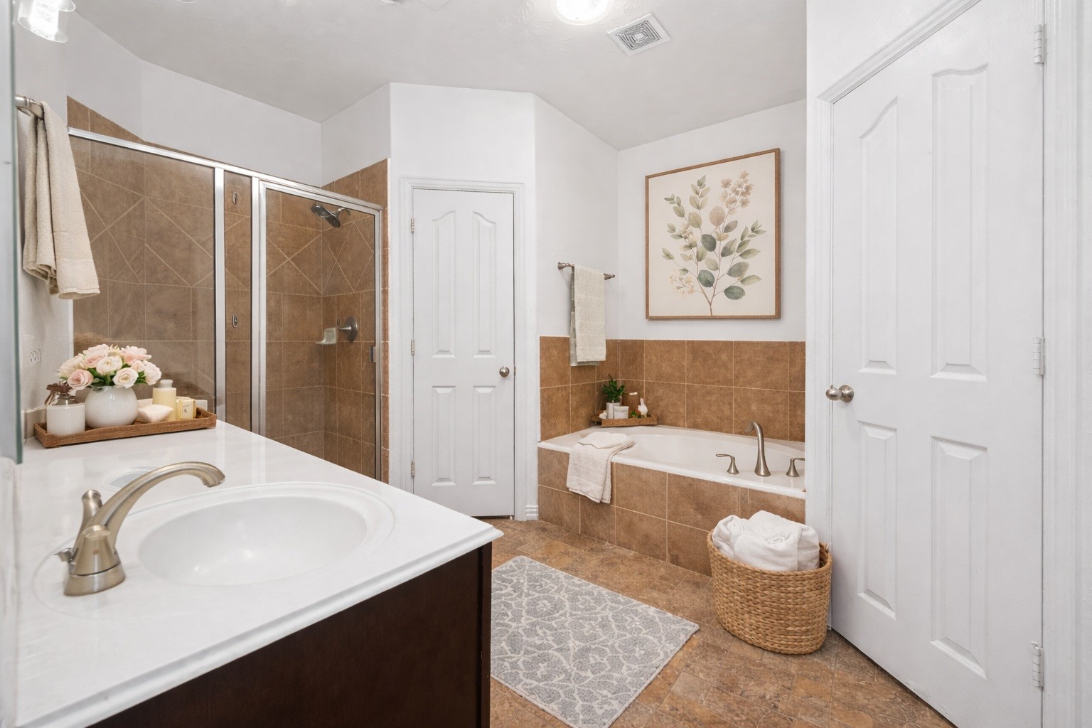 311 Volute Drive Rosharon, TX 77583 - Photo 15 of 21 a bathroom with a sink a bath tub and a shower