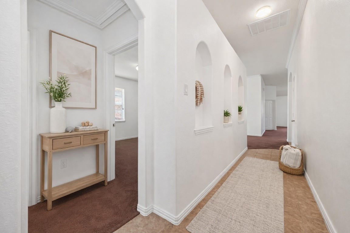 311 Volute Drive Rosharon, TX 77583 - Photo 3 of 17 a bathroom with a sink and a mirror