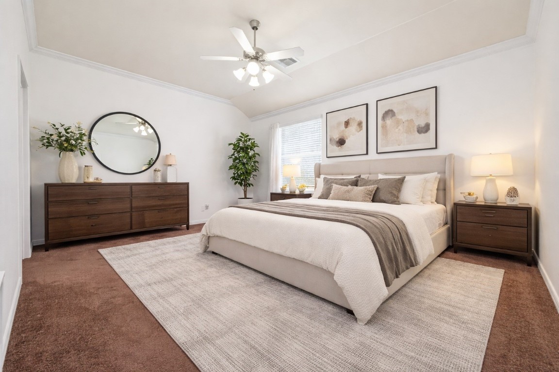 311 Volute Drive Rosharon, TX 77583 - Photo 7 of 17 a bedroom with a large bed mirror and a potted plant