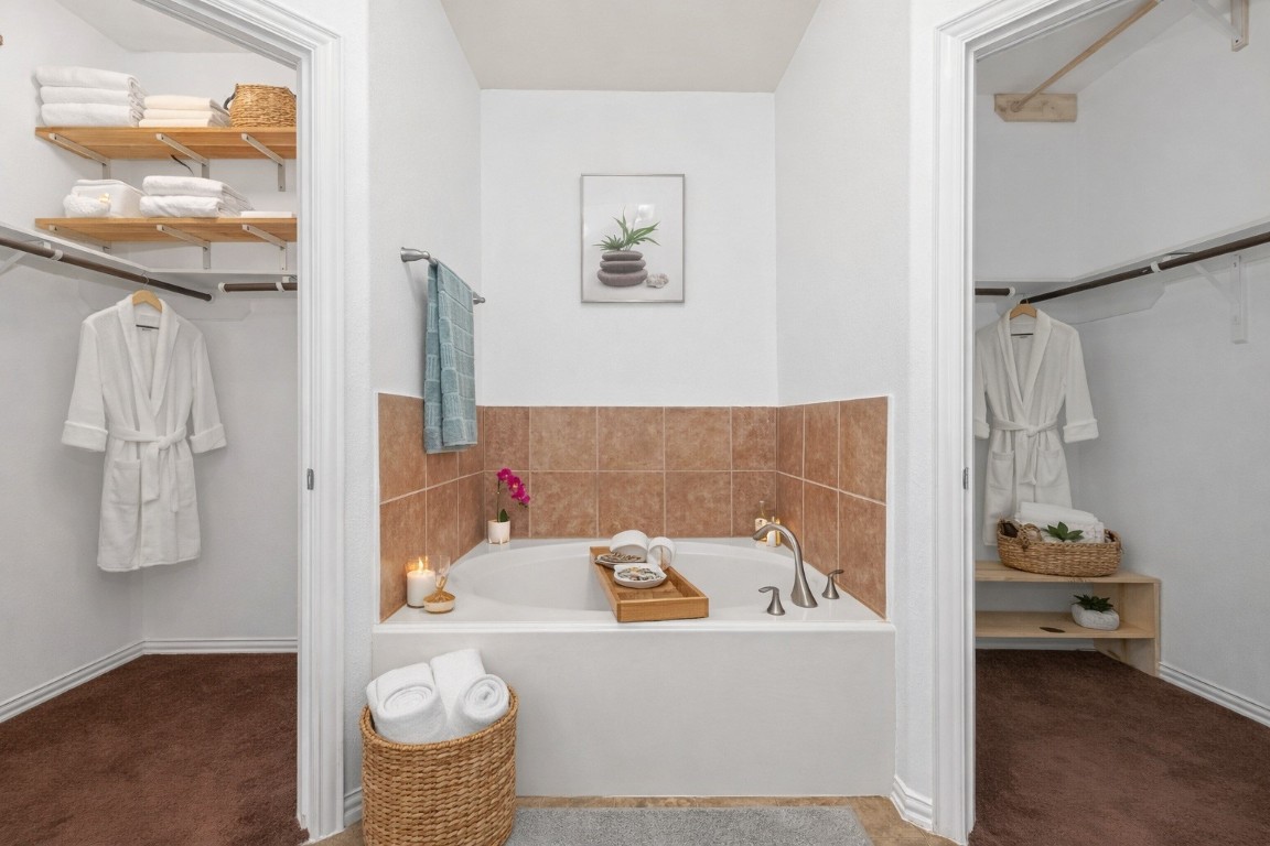 311 Volute Drive Rosharon, TX 77583 - Photo 8 of 17 a bath tub sitting next to a bathroom