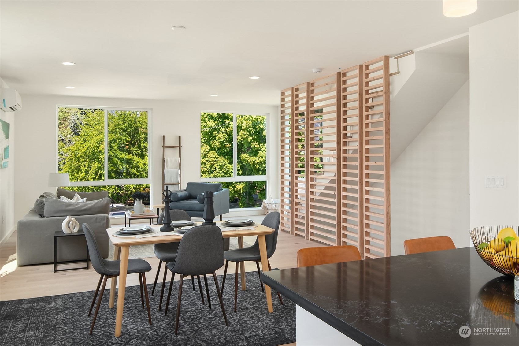647 Northwest 54th Street, Unit A Seattle, WA 98107 - Photo 17 of 28 a view of a dining room with furniture window and outside view