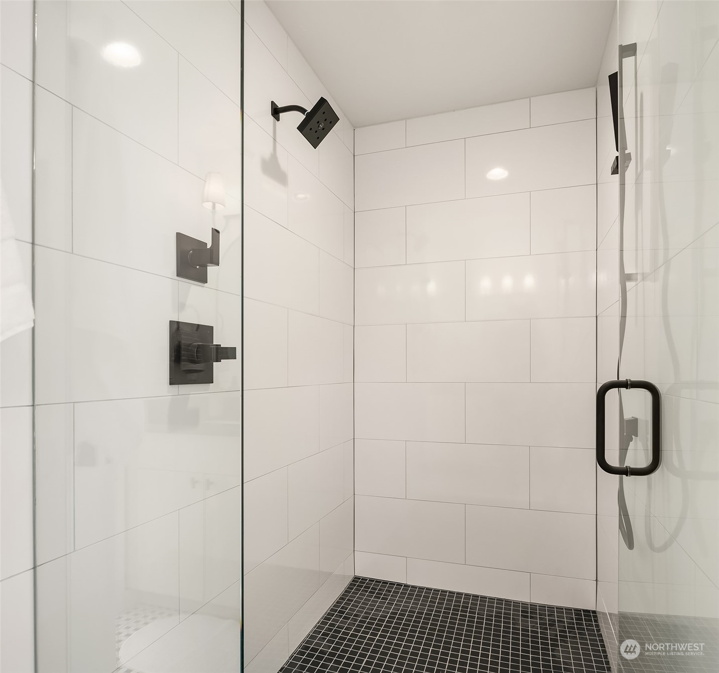 647 Northwest 54th Street, Unit A Seattle, WA 98107 - Photo 24 of 28 a bathroom with a shower