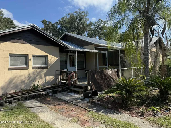 a view of a house with a patio