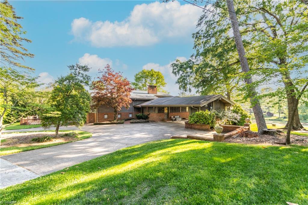 Welcome home to 3202 Bridle Trail!!  Tremendous opportunity to own one of the most desirable properties on the Sedgefield Country Club golf course.