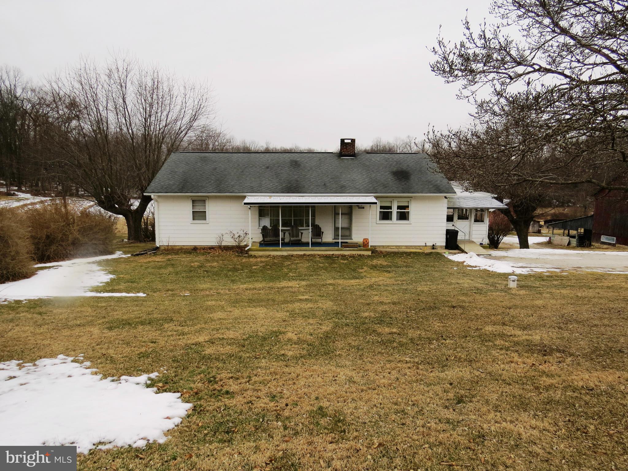 5330 St Pauls Road Manchester, MD 21102 - Photo 1 of 23 a front view of a house with a yard