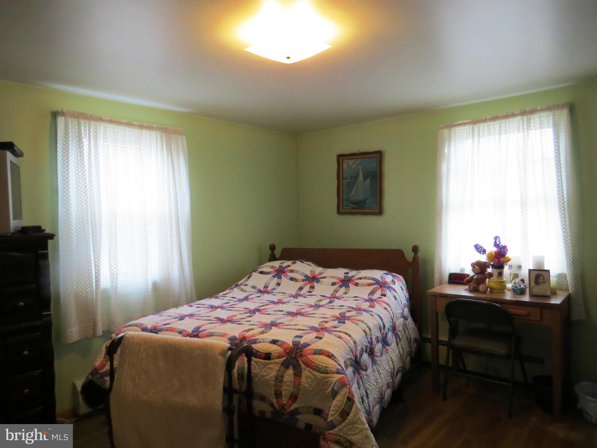 5330 St Pauls Road Manchester, MD 21102 - Photo 13 of 23 a bedroom with a bed and a window