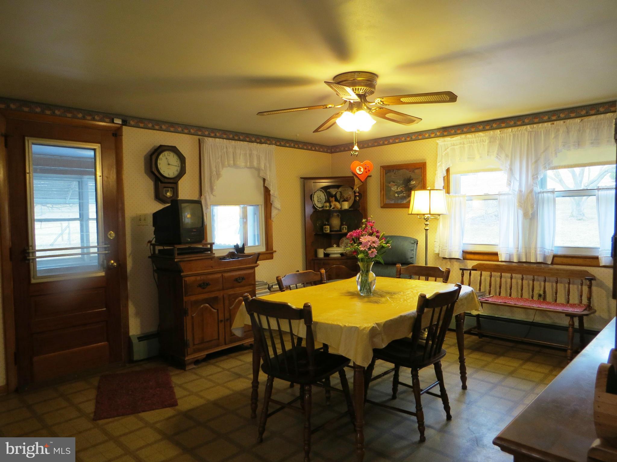 5330 St Pauls Road Manchester, MD 21102 - Photo 7 of 23 a view of a dining room with furniture and window
