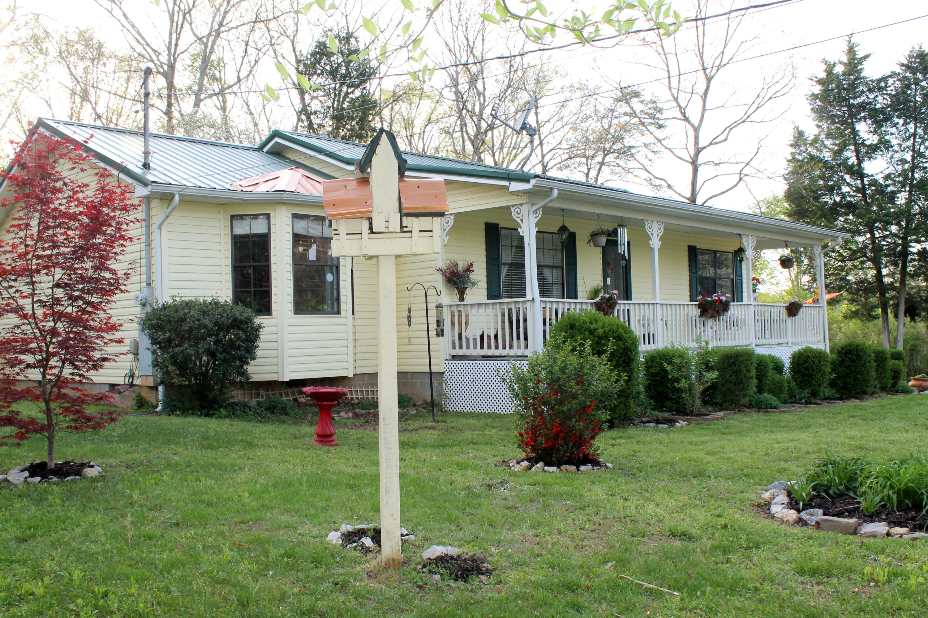 3417 Ralph Phelps Road Louisville, TN 37777 - Photo 2 of 32 A gardener's delight