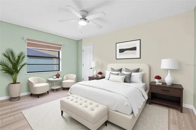 a bedroom with a bed and a couch