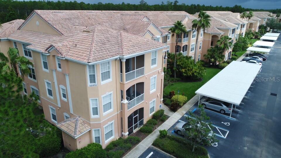 13572 Turtle Marsh Loop, Unit 230 Orlando, FL 32837 - Photo 1 of 14 an aerial view of a house