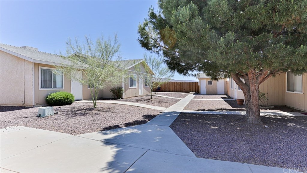 20488 Yuma Road Apple Valley, CA 92307 - Photo 1 of 1 Opposing units with nice courtyard and laundry in back