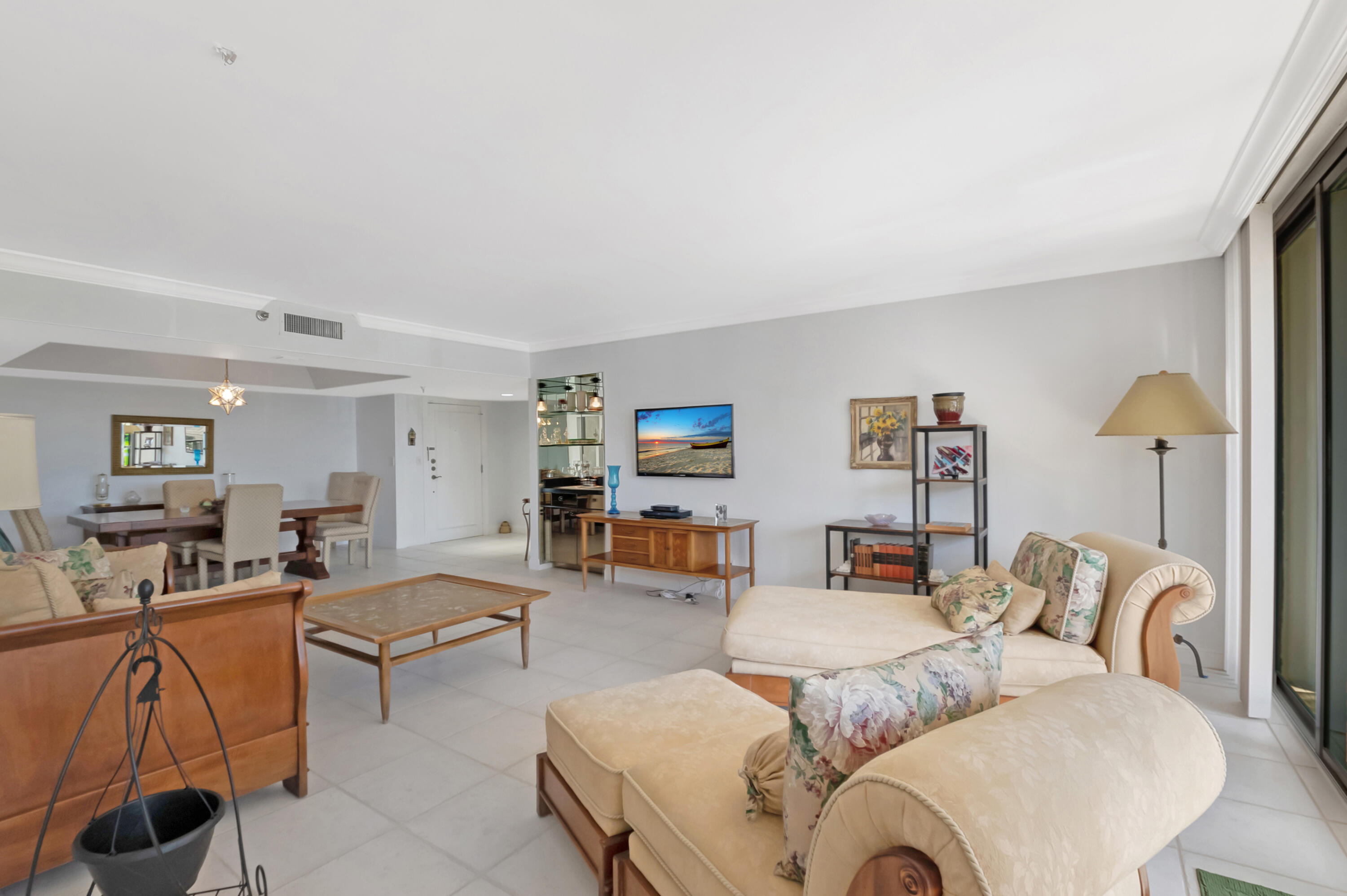 20100 Boca W Drive, Unit 126 Boca Raton, FL 33434 - Photo 17 of 58 a living room with furniture and a couch