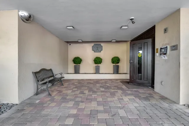 a view of a city with mountains in the background