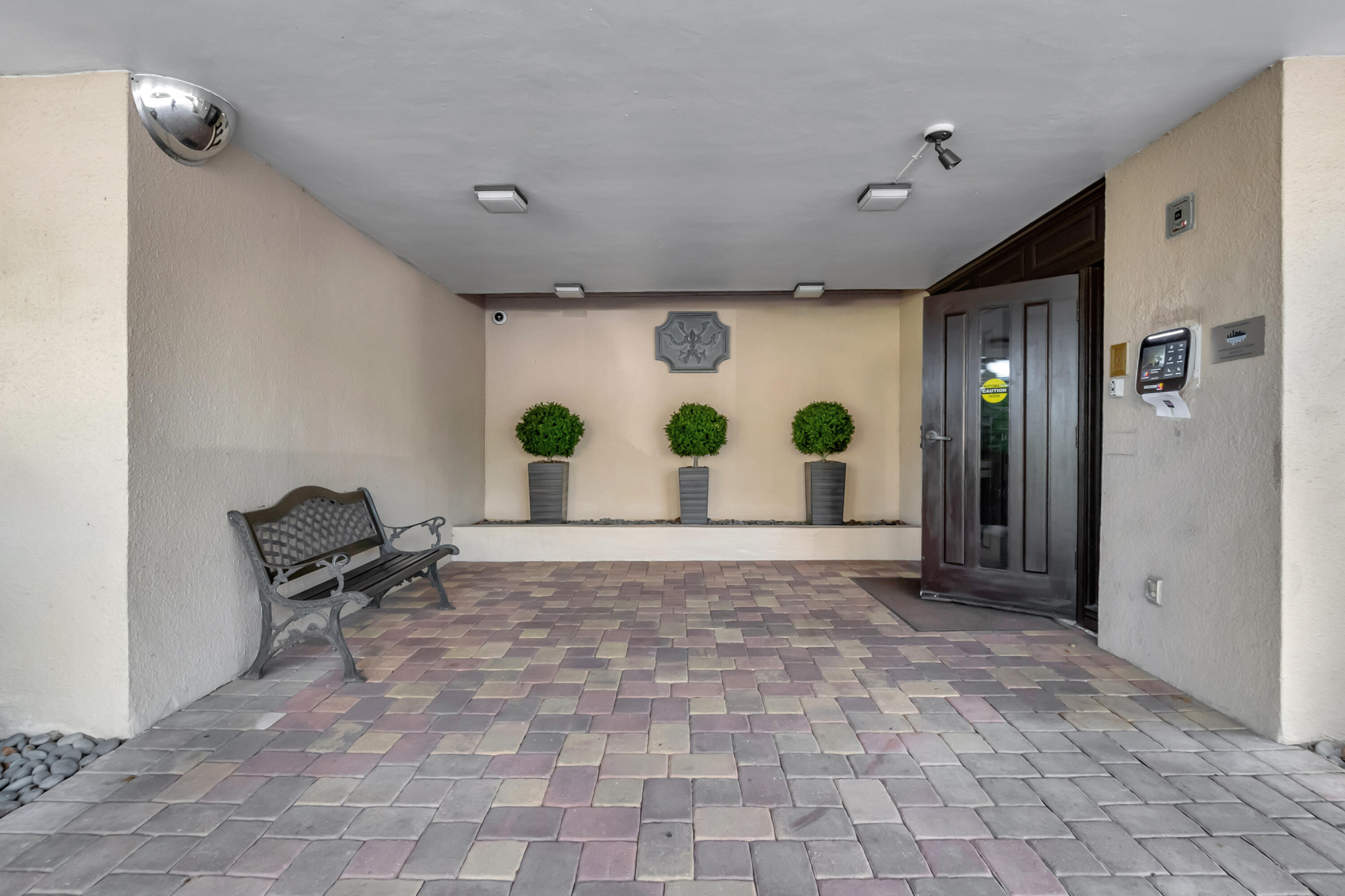 20100 Boca W Drive, Unit 126 Boca Raton, FL 33434 - Photo 34 of 58 BUILDING ENTRANCE