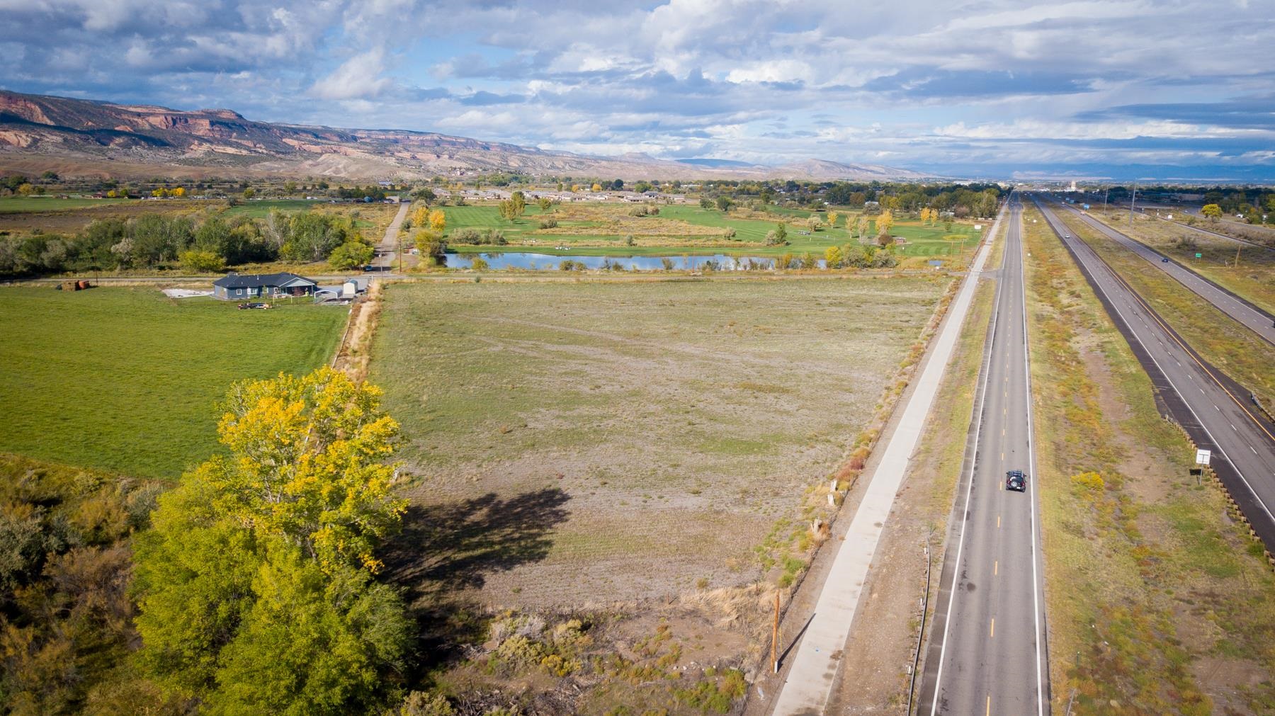 Tbd 19 Road Fruita, CO 81521 - Photo 14 of 35 a view of a lake with a ocean view