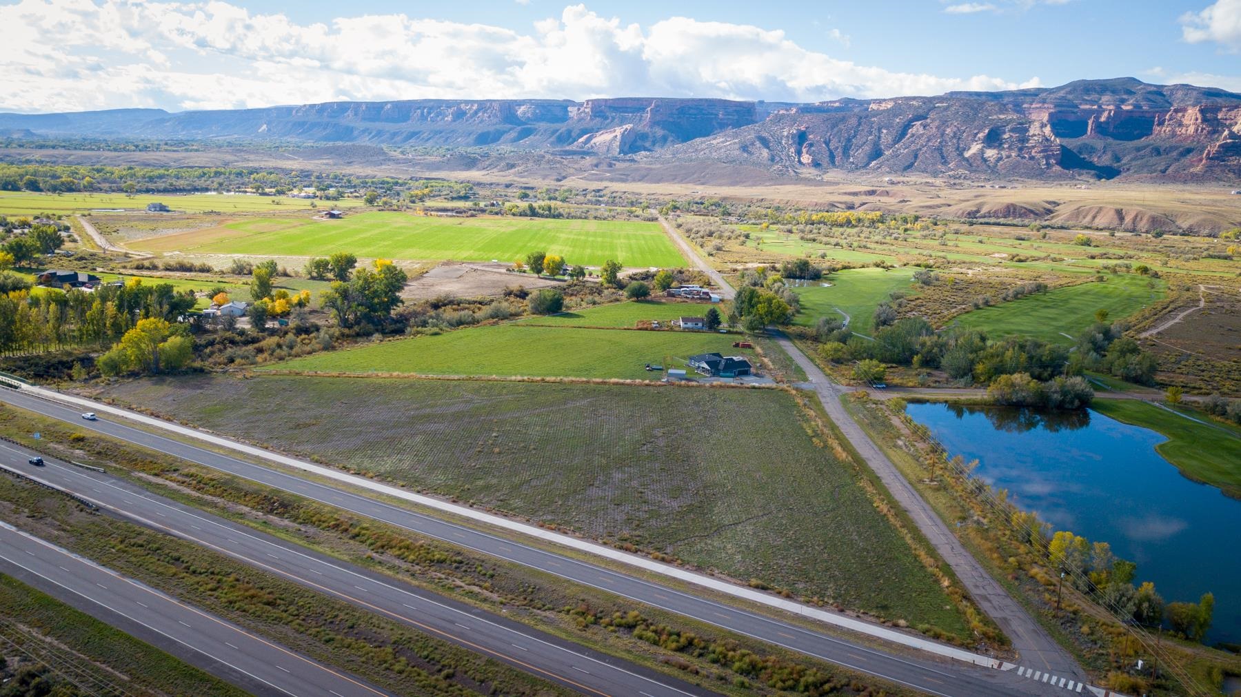Tbd 19 Road Fruita, CO 81521 - Photo 23 of 35 a view of a pool with a yard