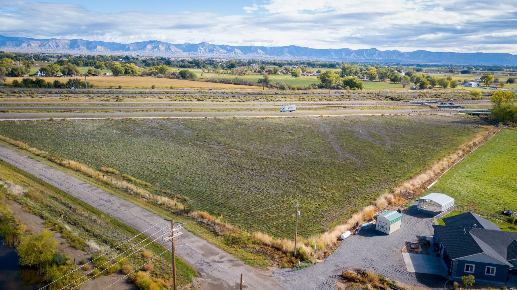 Tbd 19 Road Fruita, CO 81521 - Photo 9 of 35 a view of an ocean and a mountain view