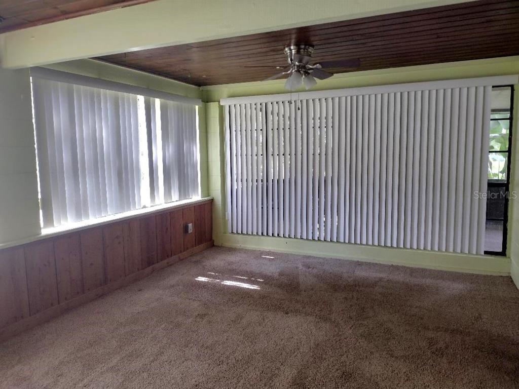 651 Old Haw Creek Road Bunnell, FL 32110 - Photo 14 of 28 a view of an empty room with a window