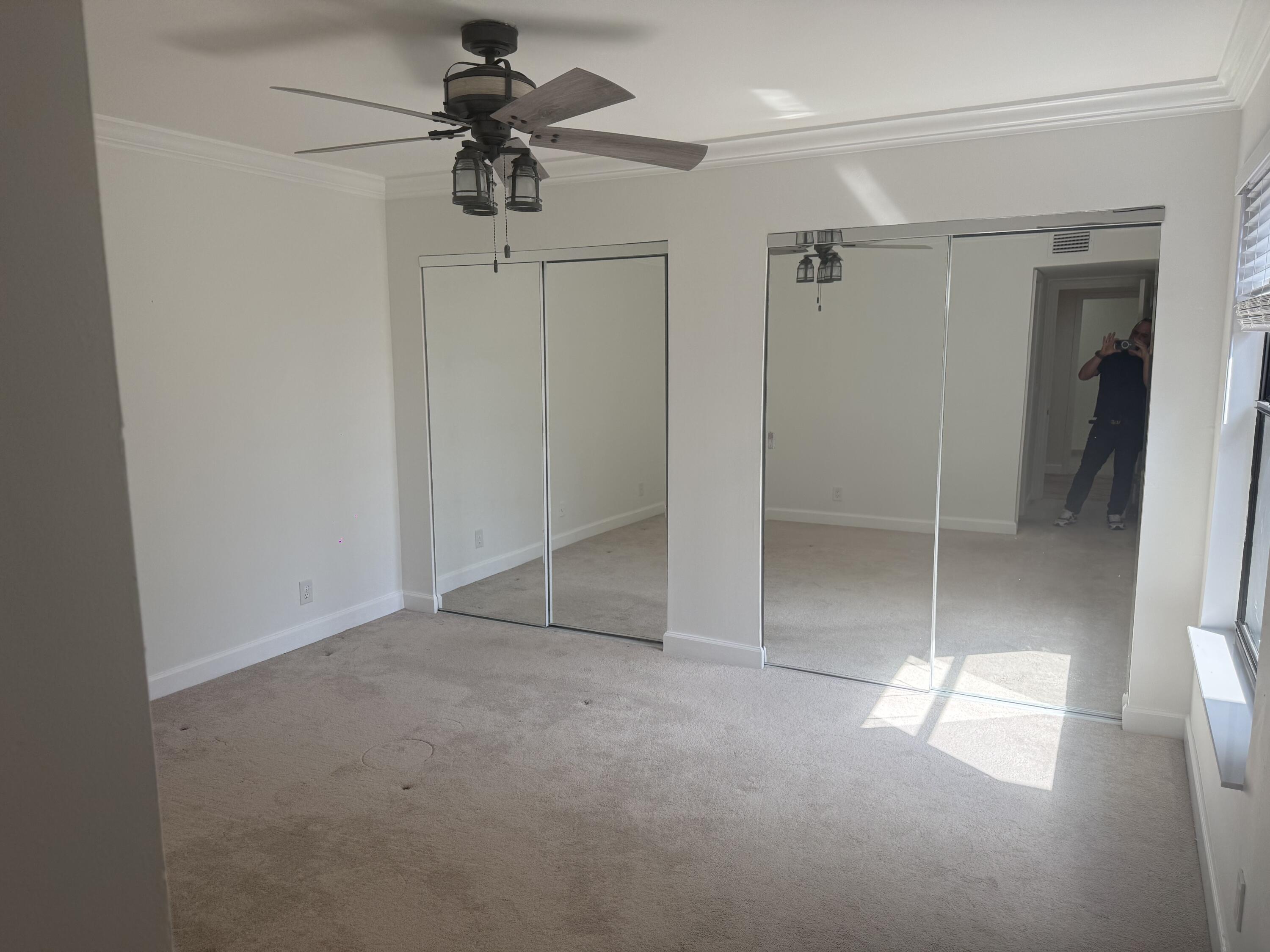 7526 Courtyard Run East Boca Raton, FL 33433 - Photo 11 of 16 a view of empty room with ceiling fan