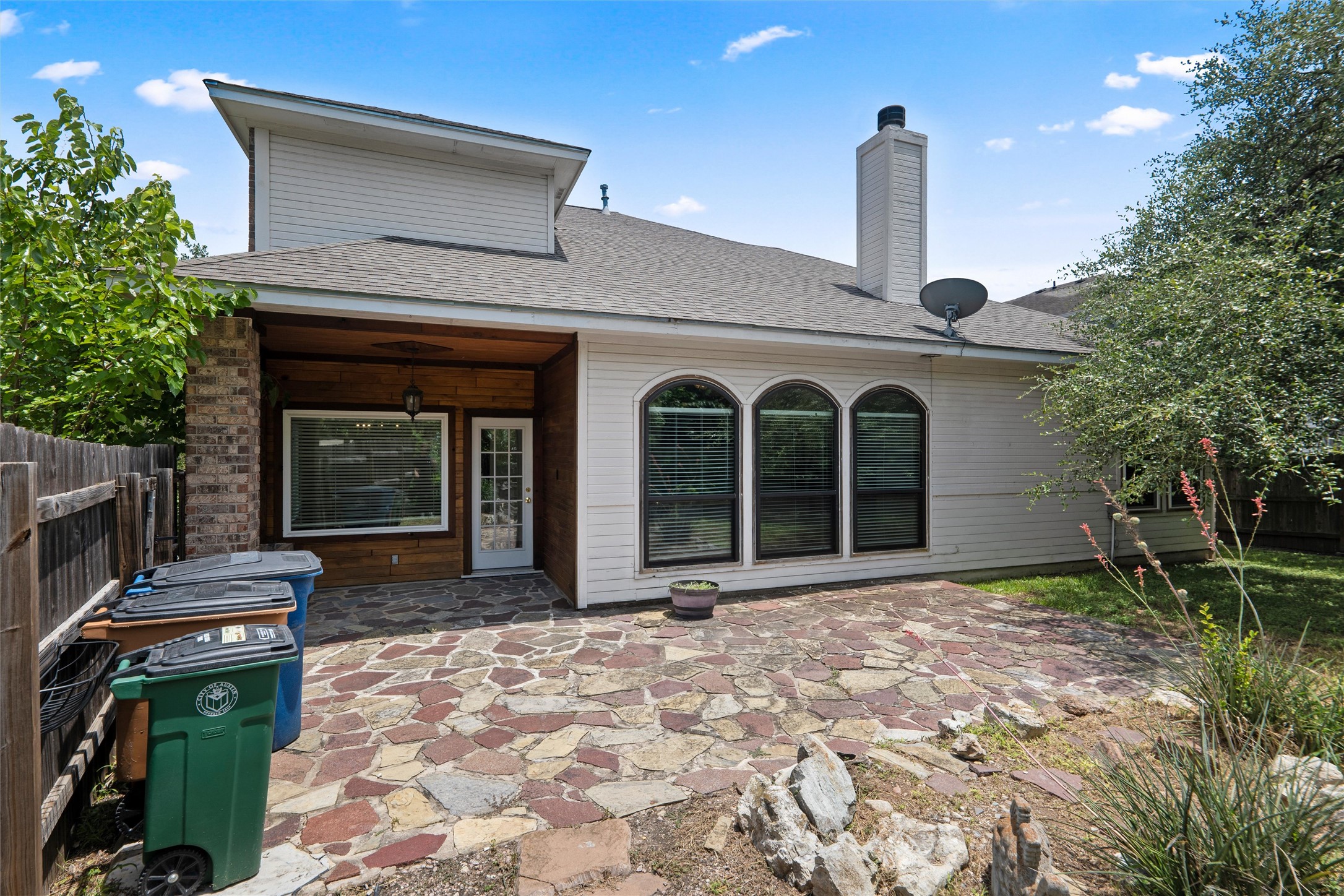 7000 Colberg Court Austin, TX 78749 - Photo 36 of 40 A spacious flagstone patio creates an ideal setting for outdoor gatherings.