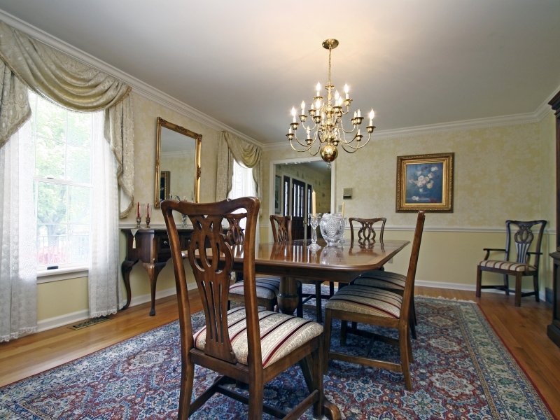 29 Middle Ridge Road New Canaan, CT 06840 - Photo 4 of 16 a view of a dining room with furniture and chandelier