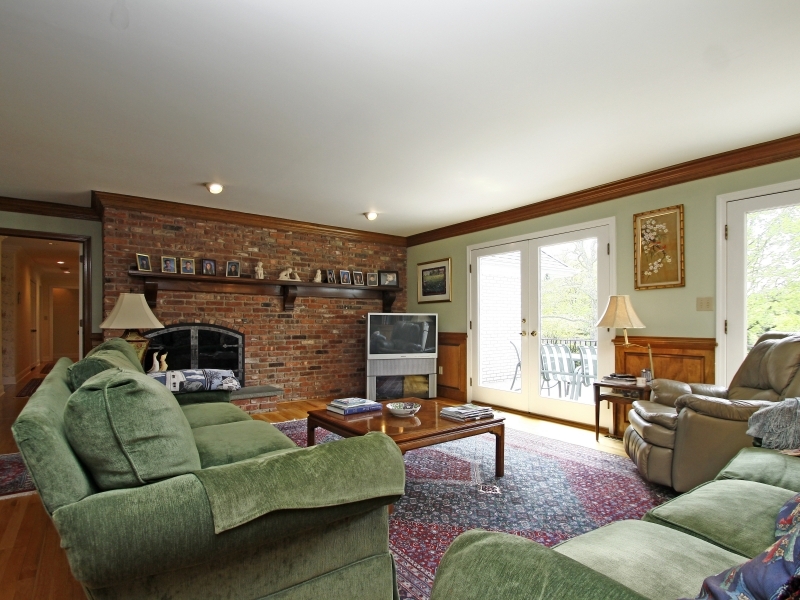 29 Middle Ridge Road New Canaan, CT 06840 - Photo 7 of 16 a living room with furniture a large window and a flat screen tv