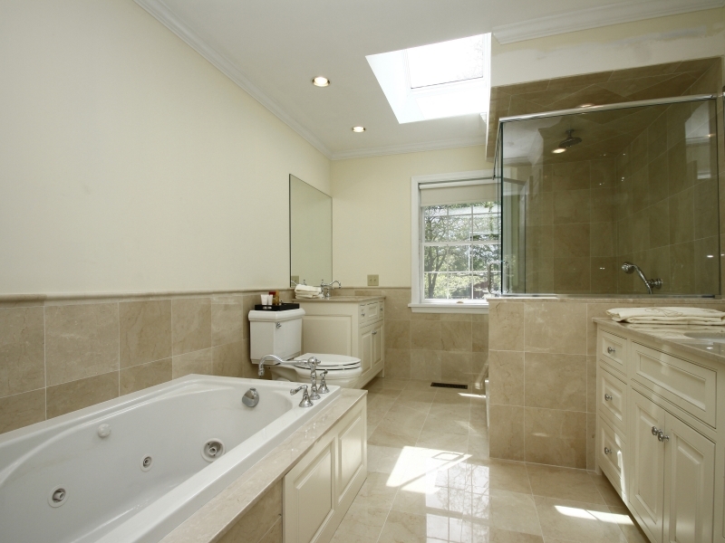 29 Middle Ridge Road New Canaan, CT 06840 - Photo 9 of 16 a bathroom with a bathtub sink and toilet